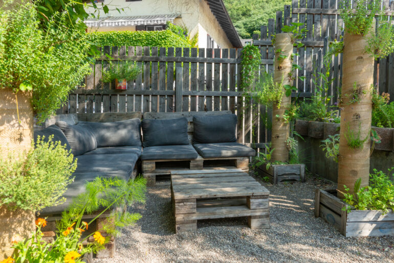 sitting area and plants in a garden